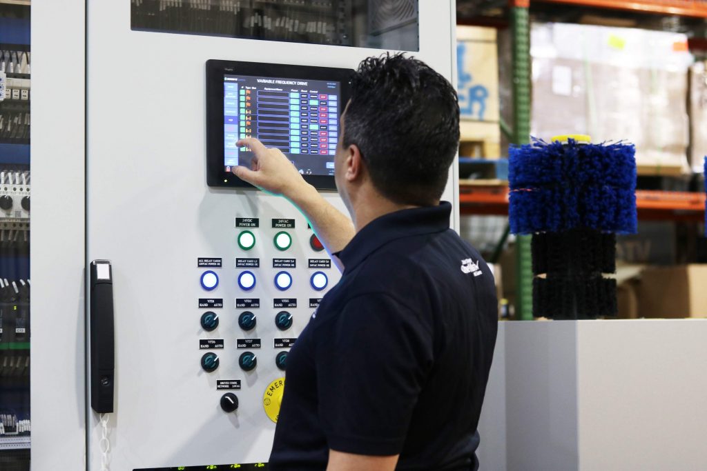 An employee programming using an HMI.